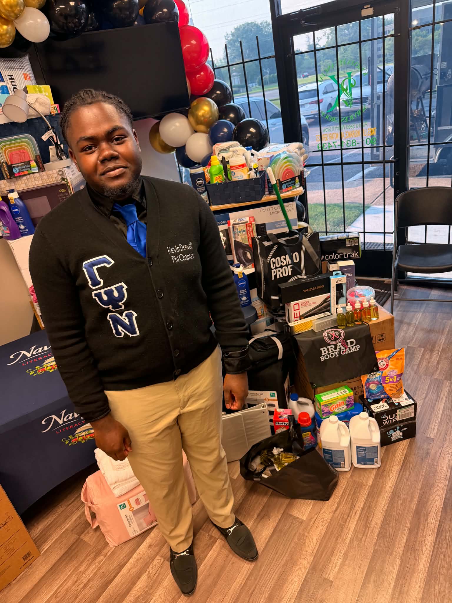 College-bound student with donated dorm essentials and career supplies